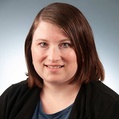 a woman smiling for the camera