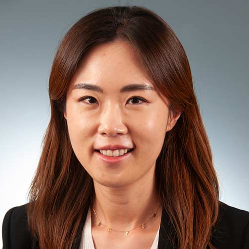 a woman smiling for the camera