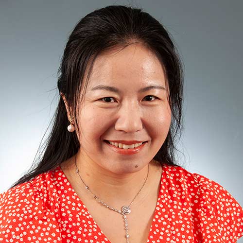 a woman smiling for the camera