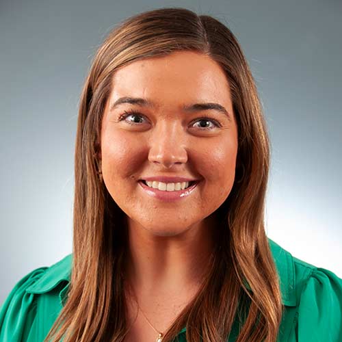 a woman smiling for the camera